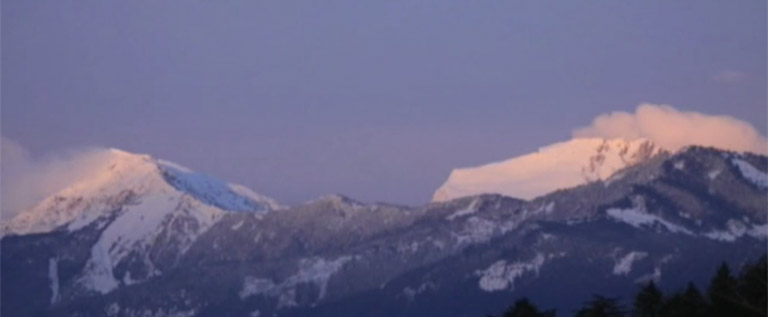 A view of the snow-capped mountains. 